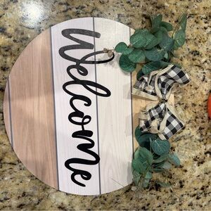 Rustic Welcome Sign with Greenery and Bow